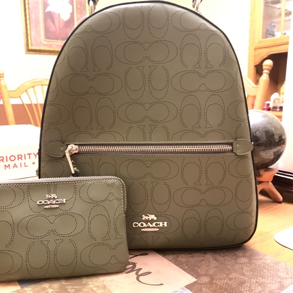 Coach Handbags - NWT olive green coach backpack with matching wristlet. Backpack is 11”x10”x4”.